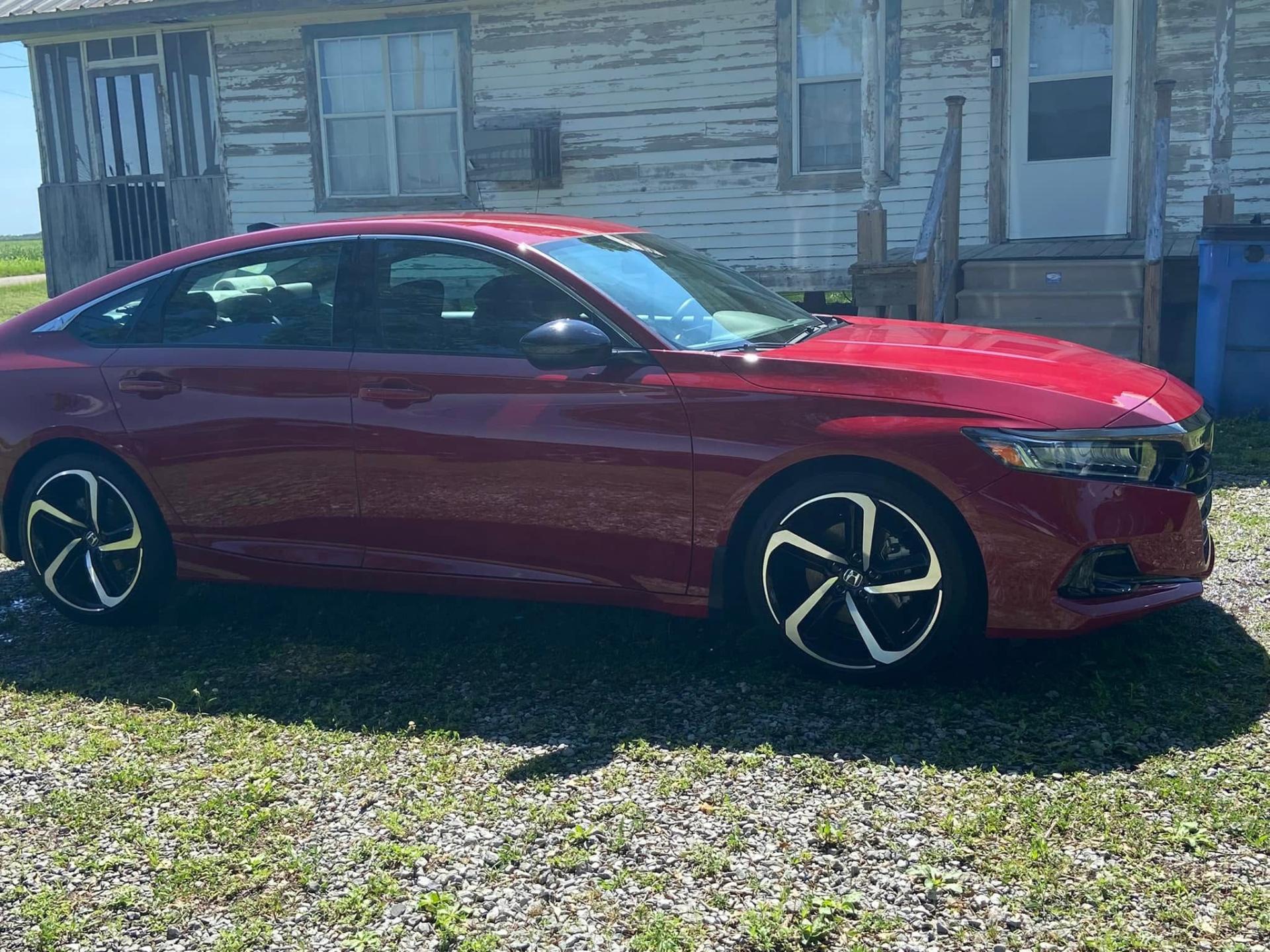 Red Honda Accord Sport with mirror-finish paint