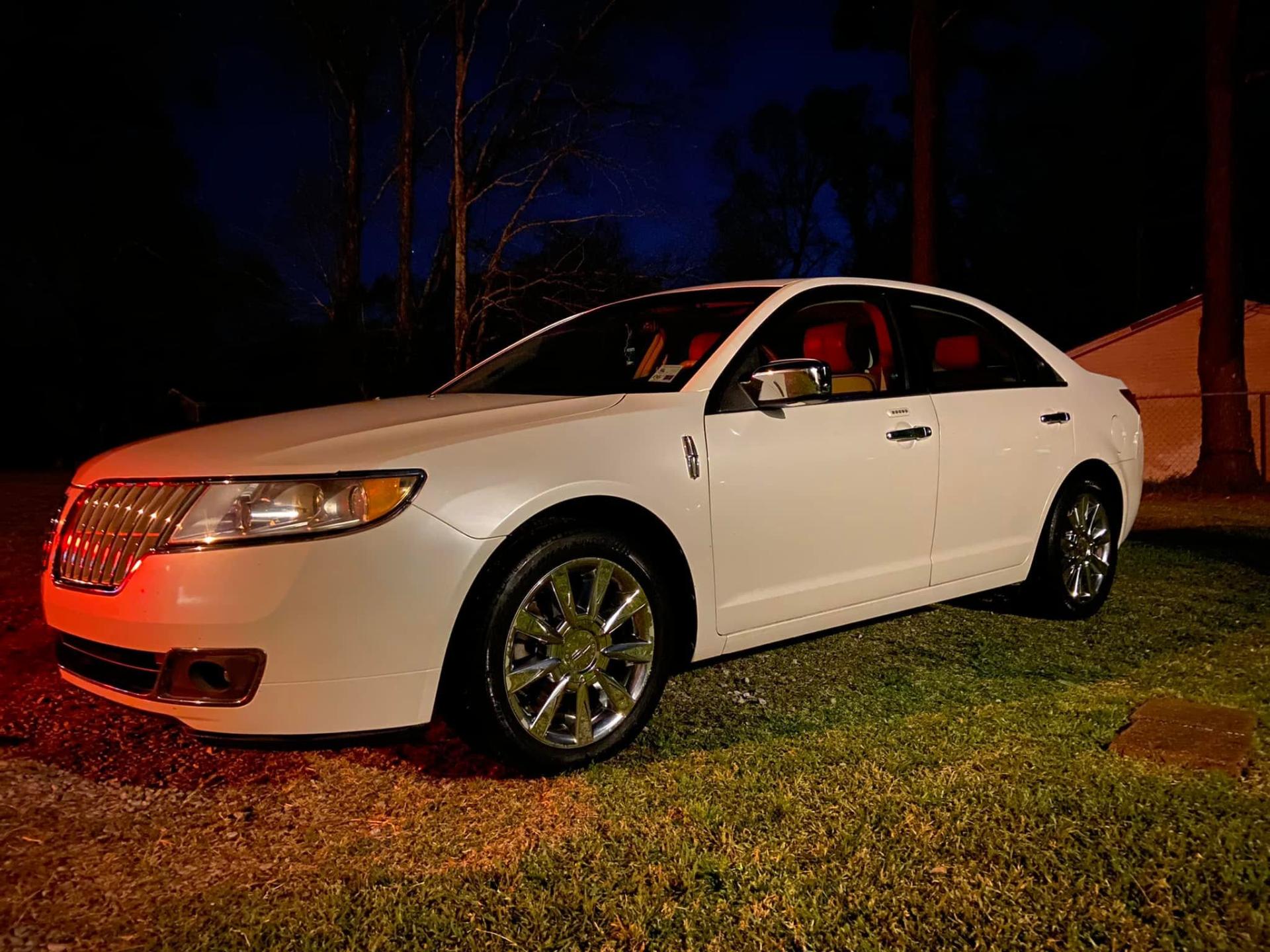 White Lincoln MKZ night shine after detail