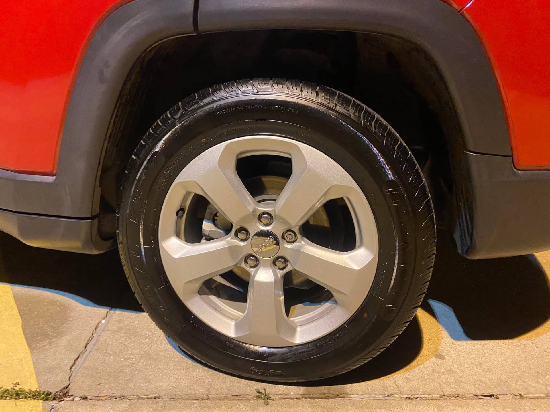 Jeep wheel with restored tire shine