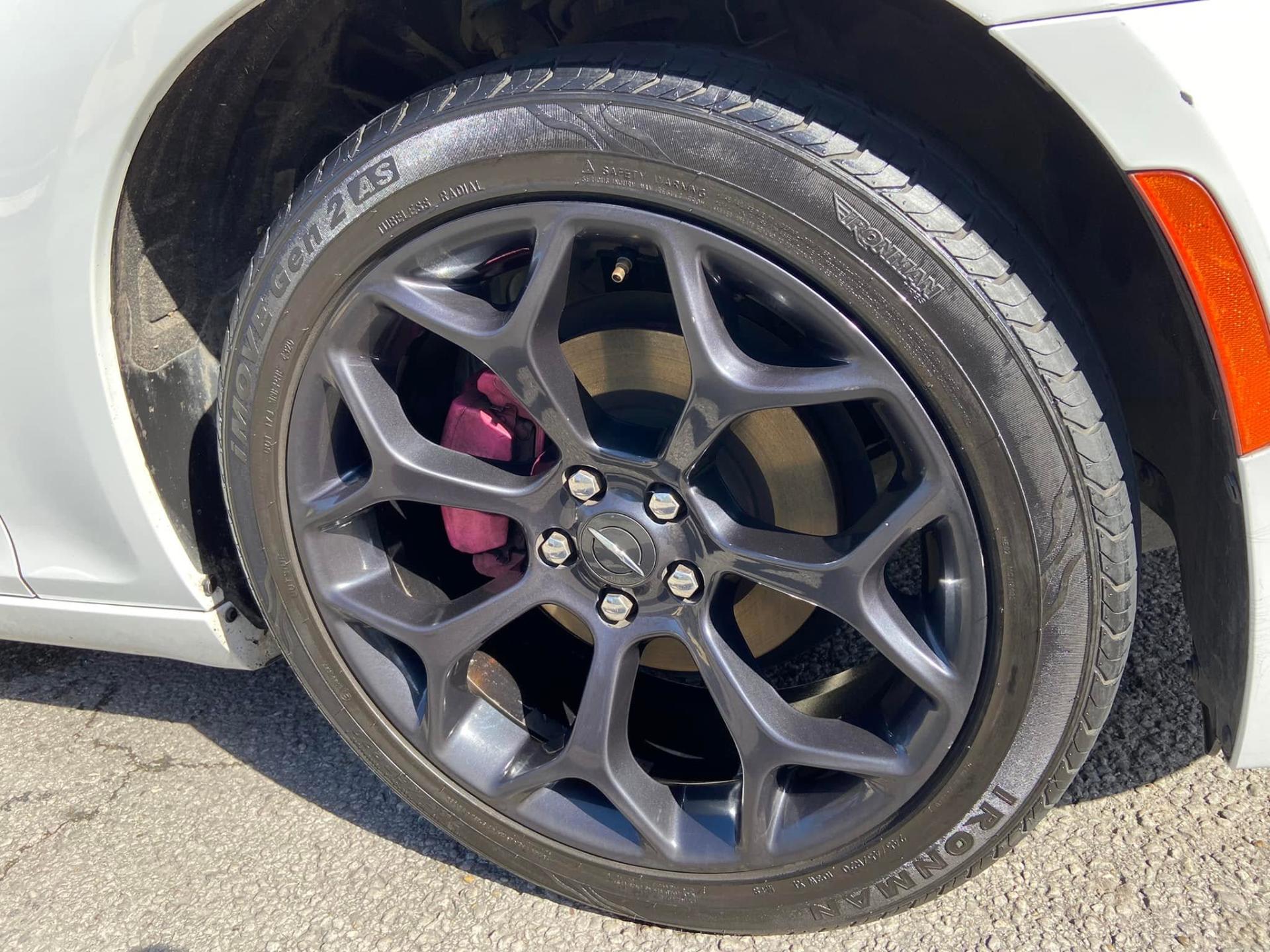 Charger wheel with pink caliper detailed